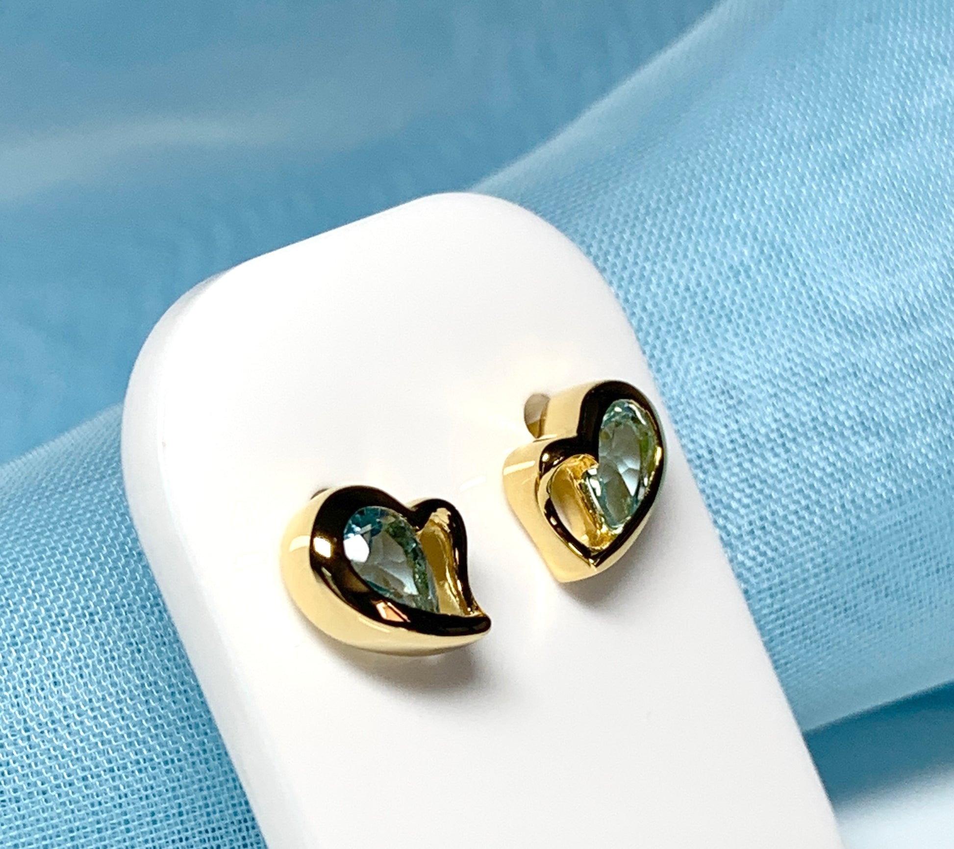 Real light blue topaz heart shaped stud earrings gold plated sterling silver gilt