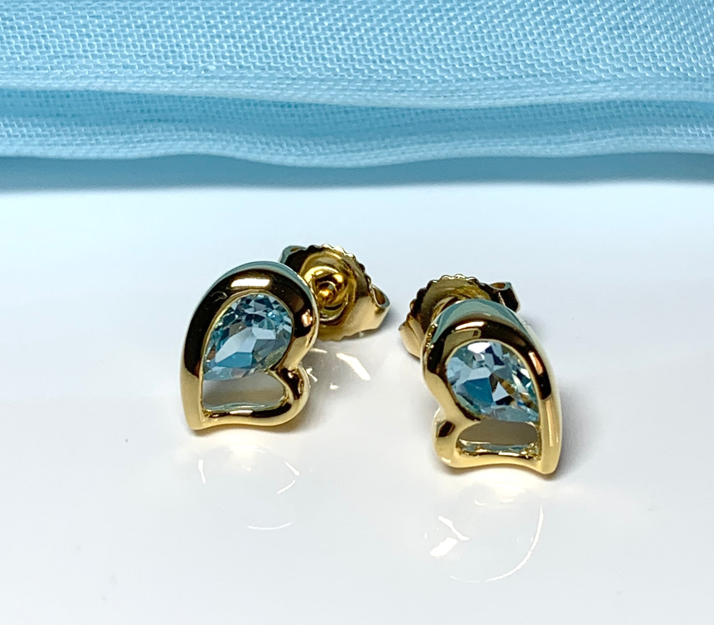 Real light blue topaz heart shaped stud earrings gold plated sterling silver gilt