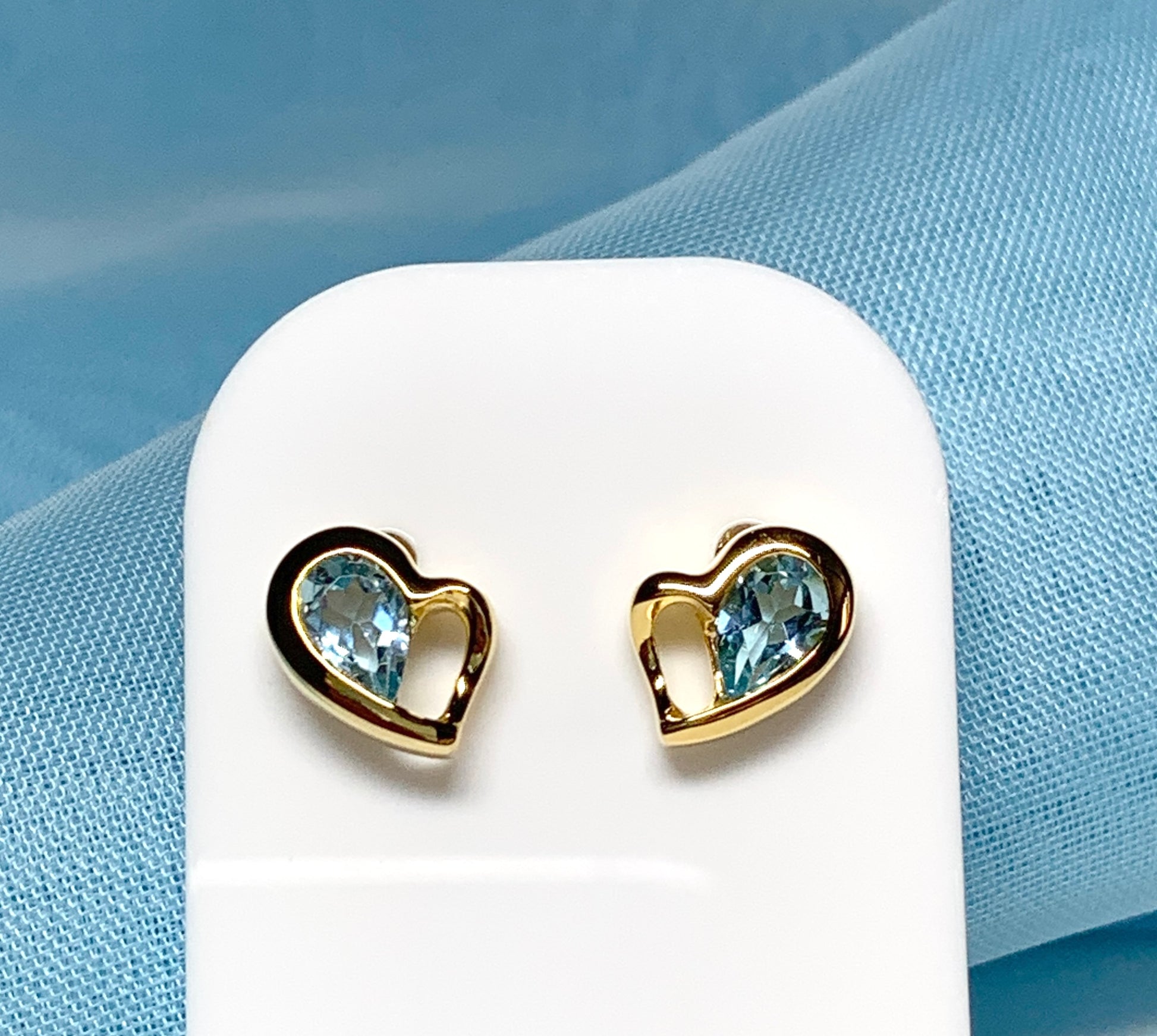 Real light blue topaz heart shaped stud earrings gold plated sterling silver gilt