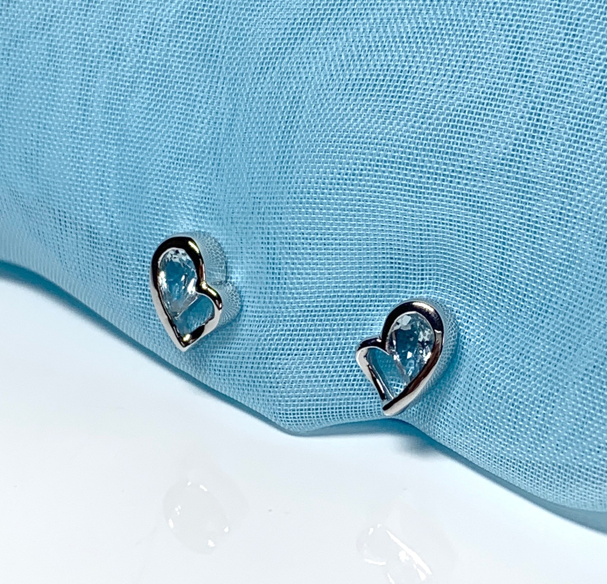 Real light blue topaz heart shaped stud earrings sterling silver