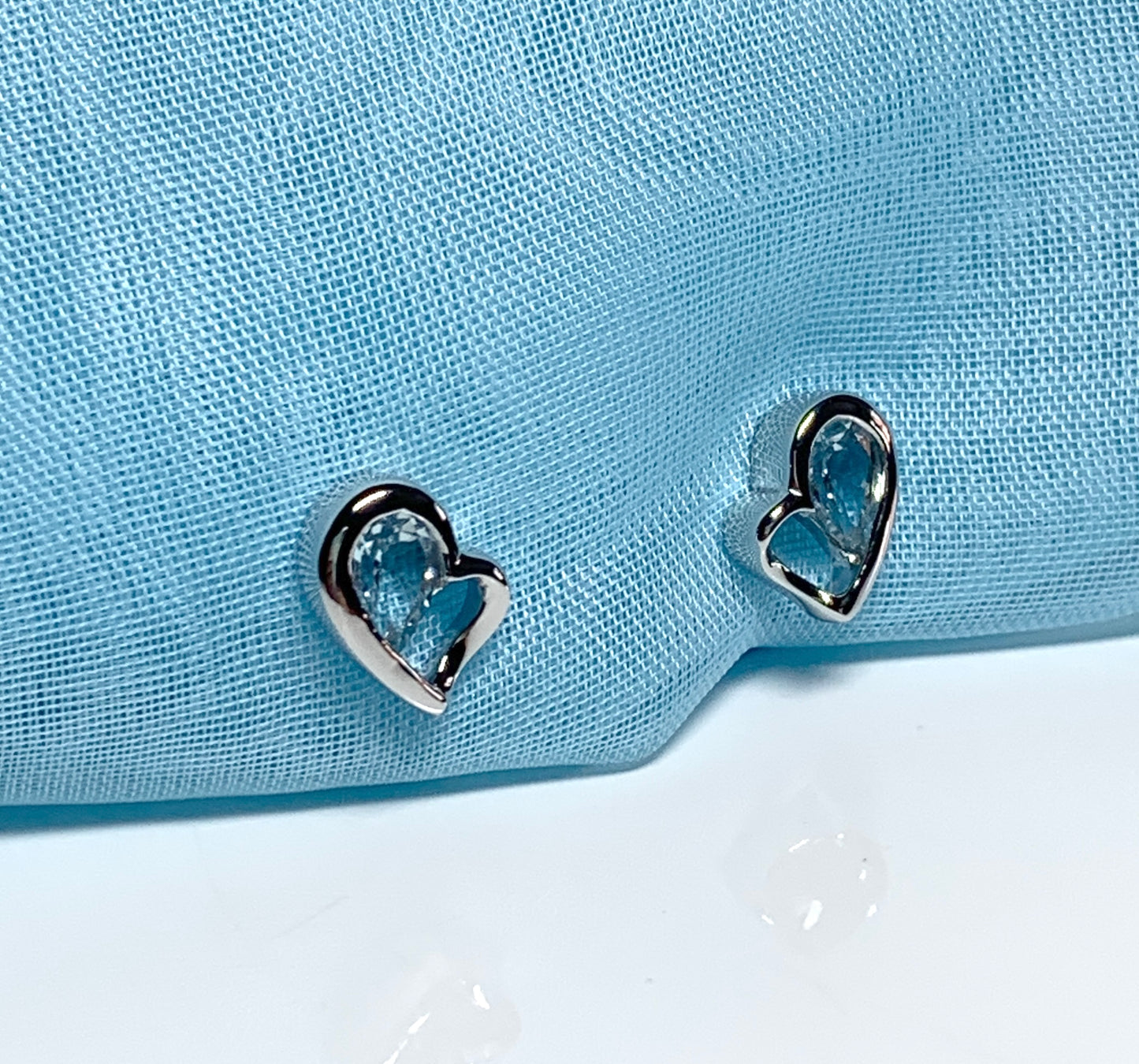 Real light blue topaz heart shaped stud earrings sterling silver