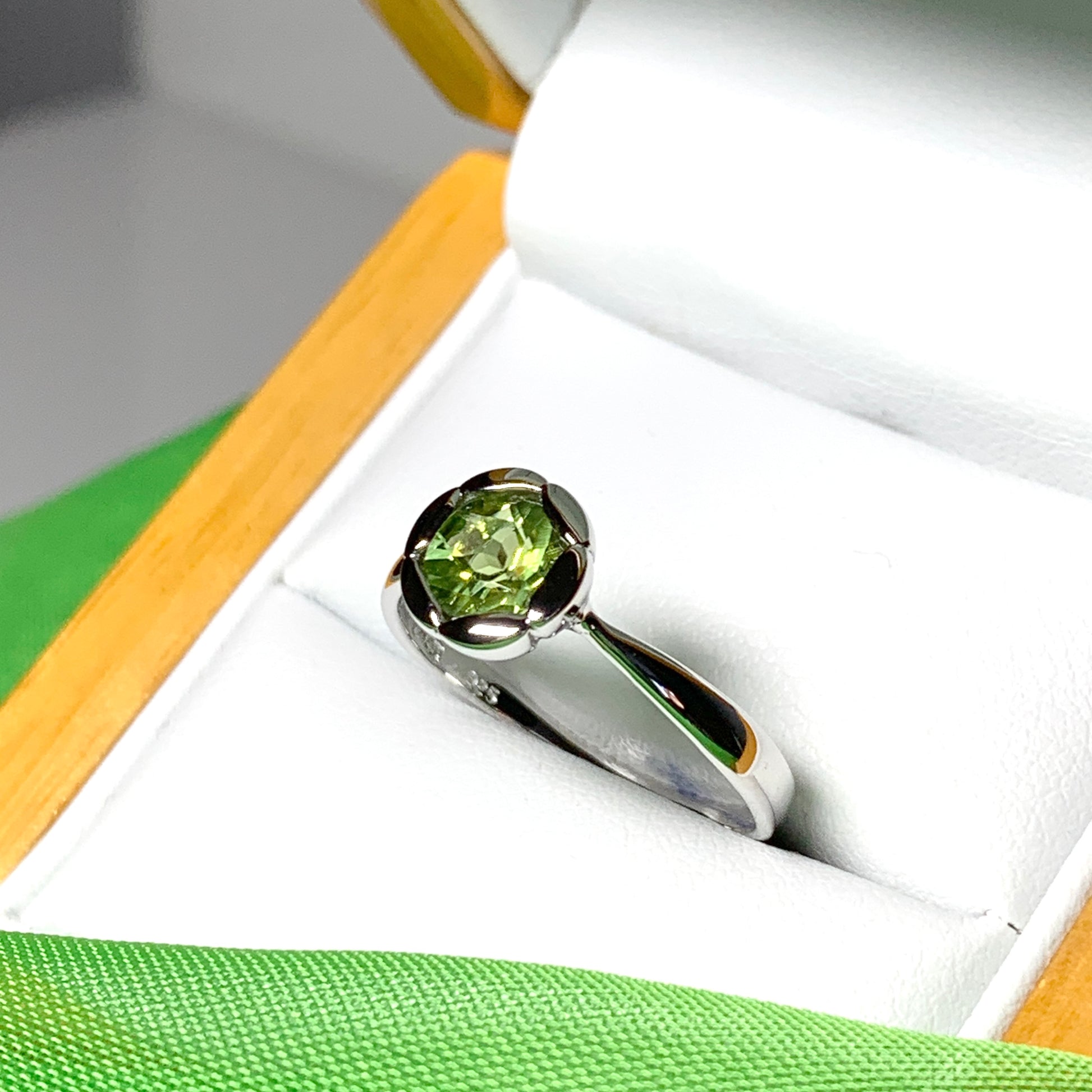 Real light green peridot dress ring ladies fancy flower edged round Sarah Beth Jewellers Real light green peridot dress ring ladies fancy flower edged round Sarah Beth Jewellers