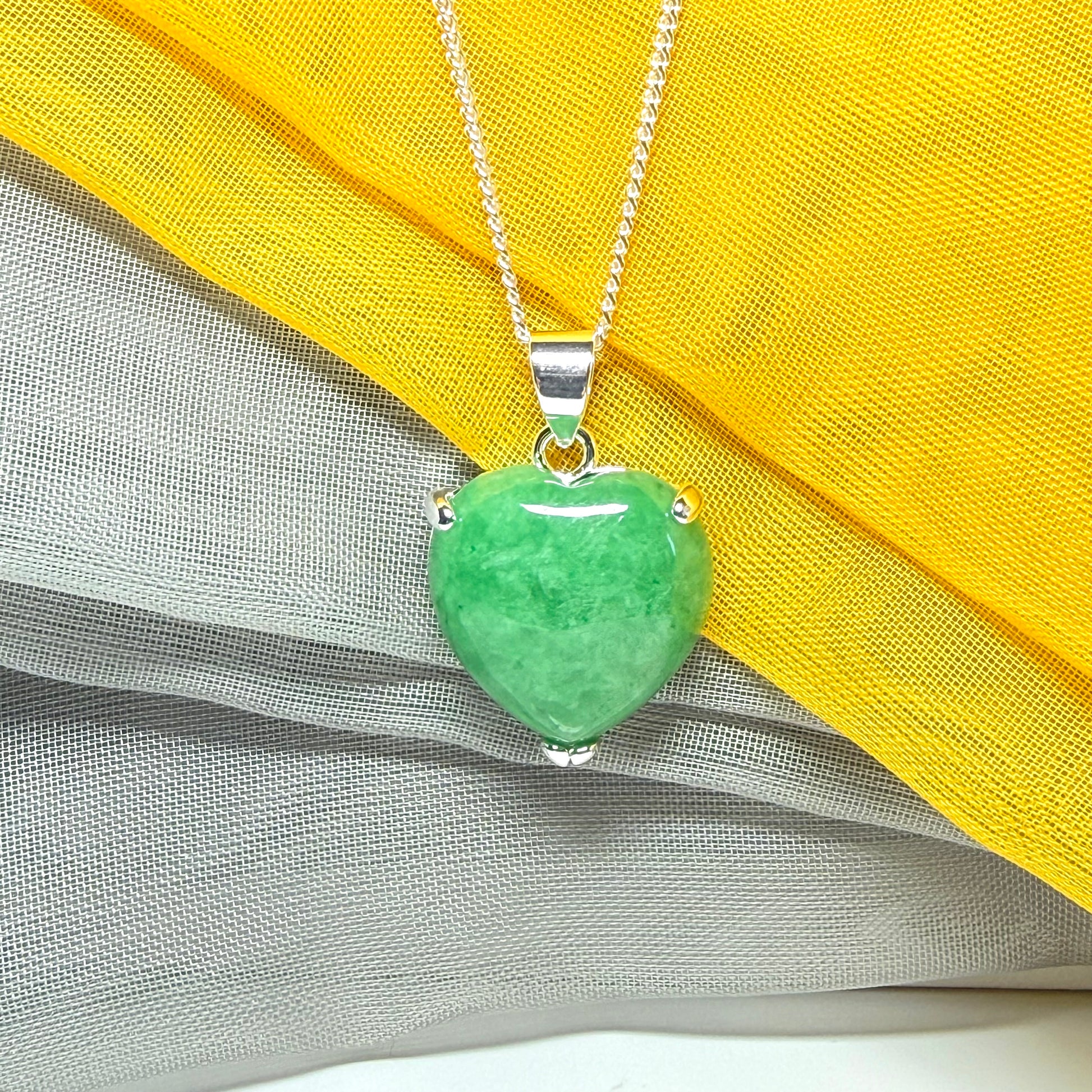A really beautiful real green jade necklace heart shaped sterling silver, a gorgeous pendant