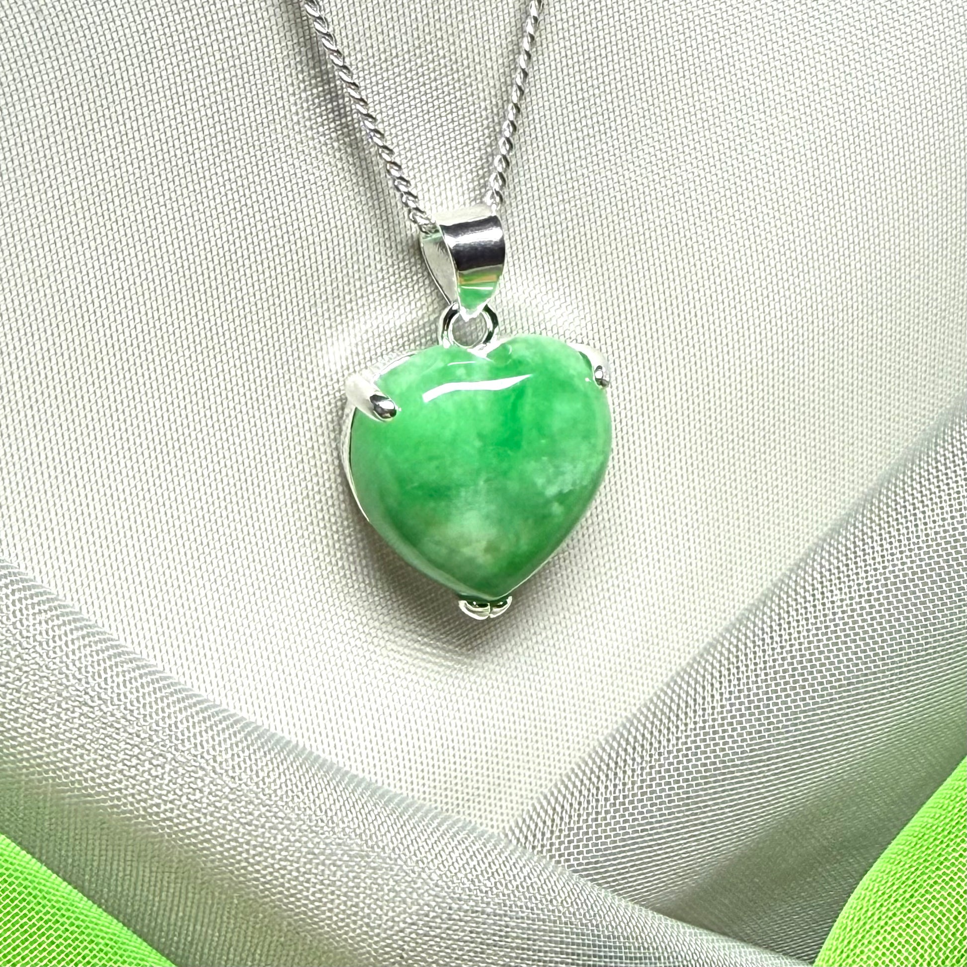 A really stunning pendant with a real green jade necklace heart shaped sterling silver