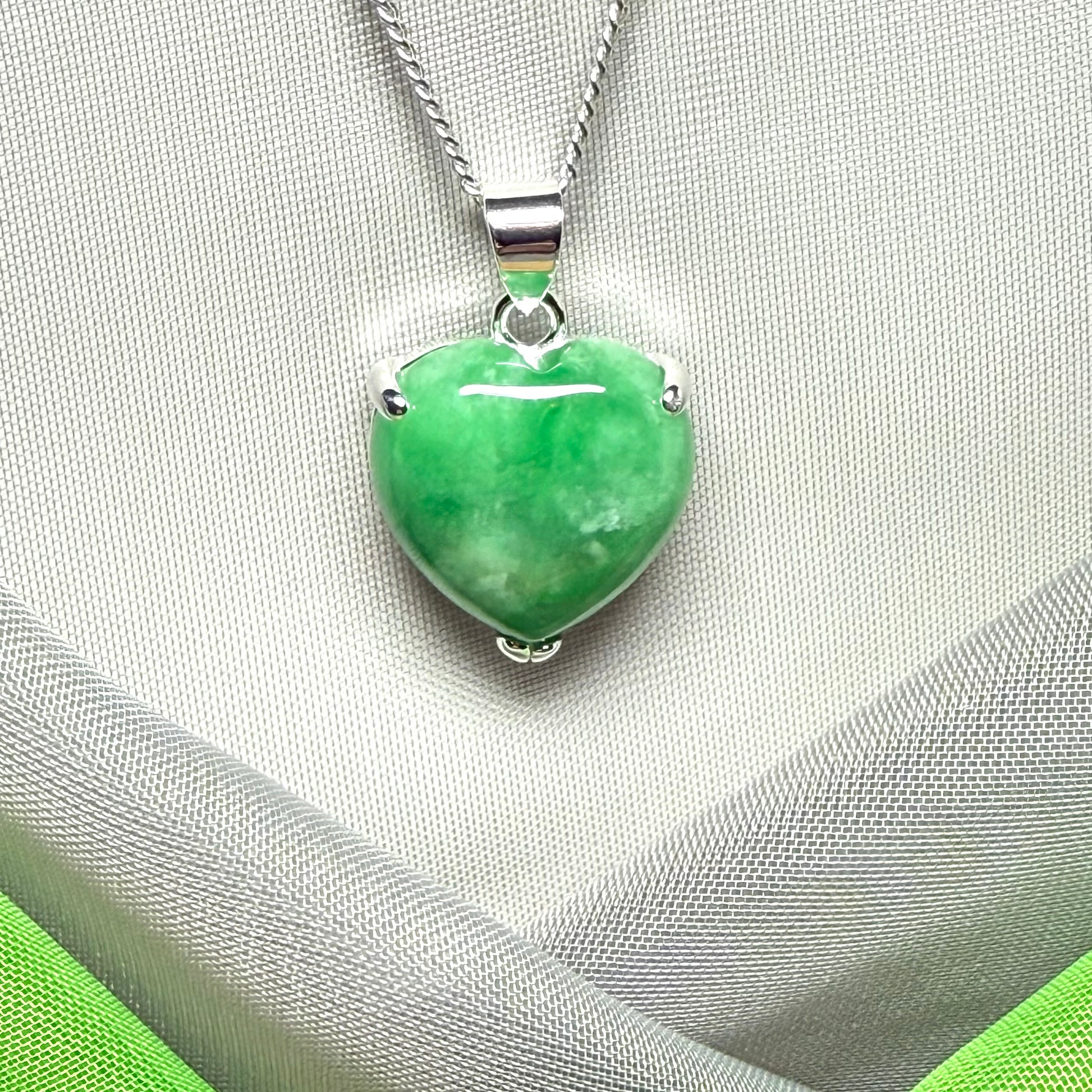 A really stunning pendant with a real green jade necklace heart shaped sterling silver