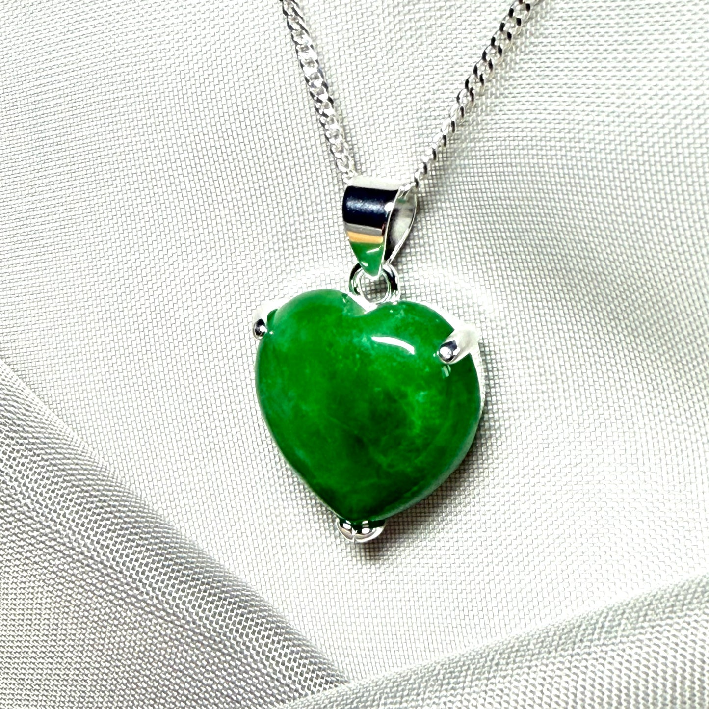 A really stunning pendant with a real jade necklace heart shaped sterling silver, green pendant