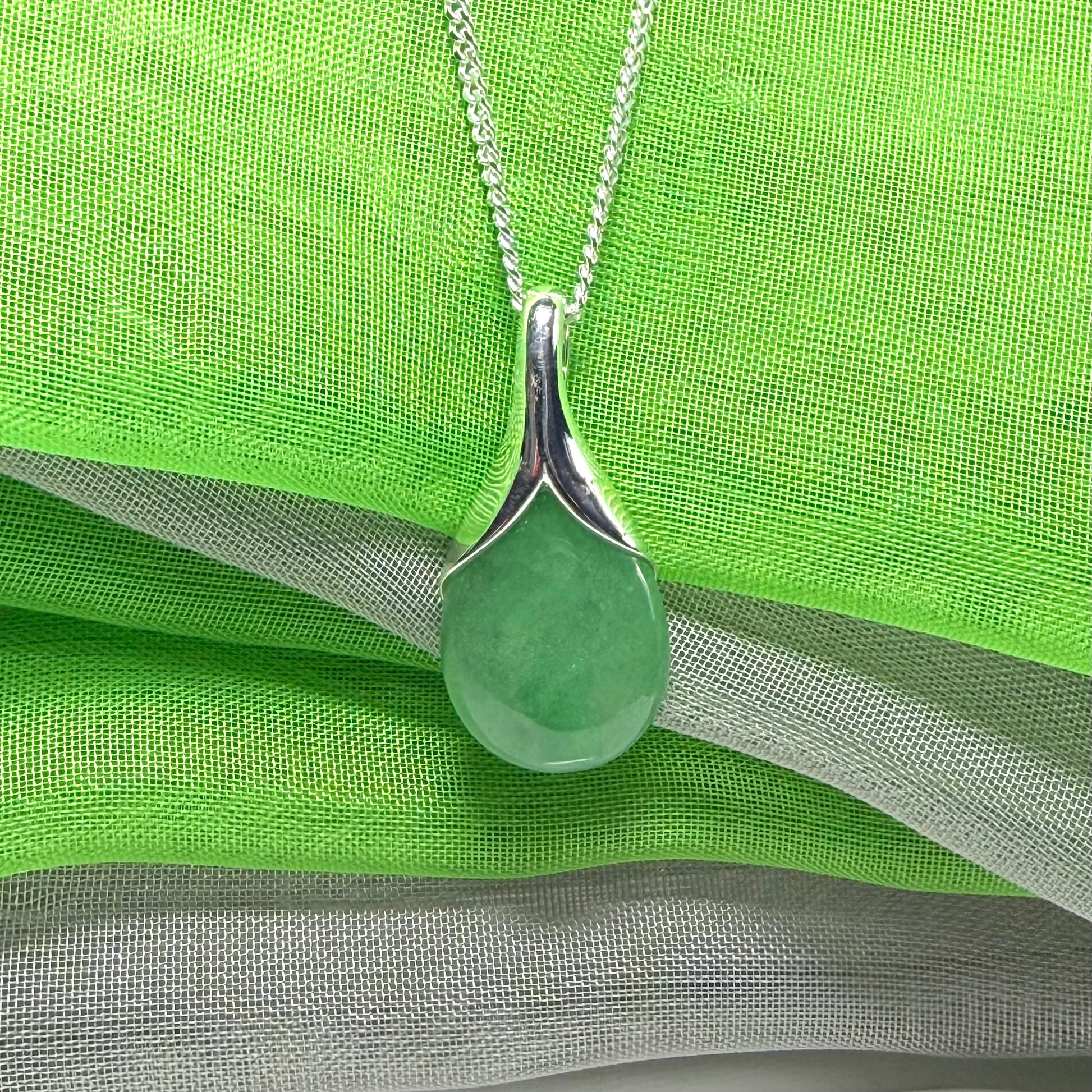 A really stunning real green jade necklace in a teardrop, a timeless design