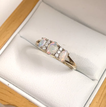 Real opal and diamond trilogy dress ring