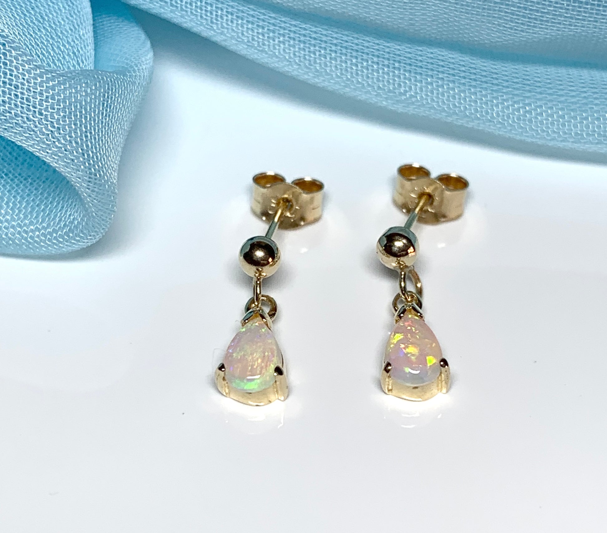 Real opal drop earrings yellow gold pear shaped