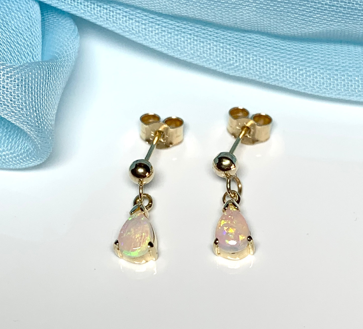 Real opal drop earrings yellow gold pear shaped