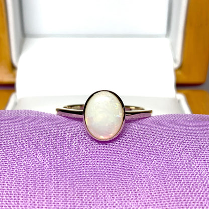 Real opal ring oval yellow gold smooth rubbed over setting