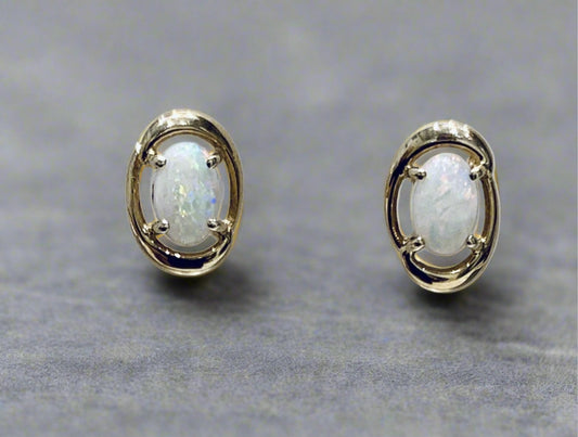 Real opal yellow gold fancy oval stud earrings