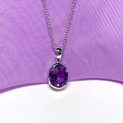 Real purple amethyst necklace pendant oval smooth rubbed over setting