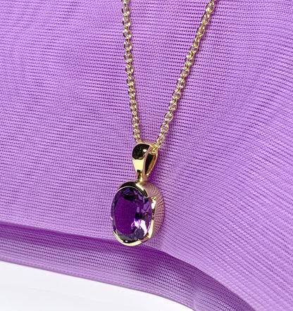 Real purple amethyst necklace pendant oval smooth rubbed over setting silver gilt