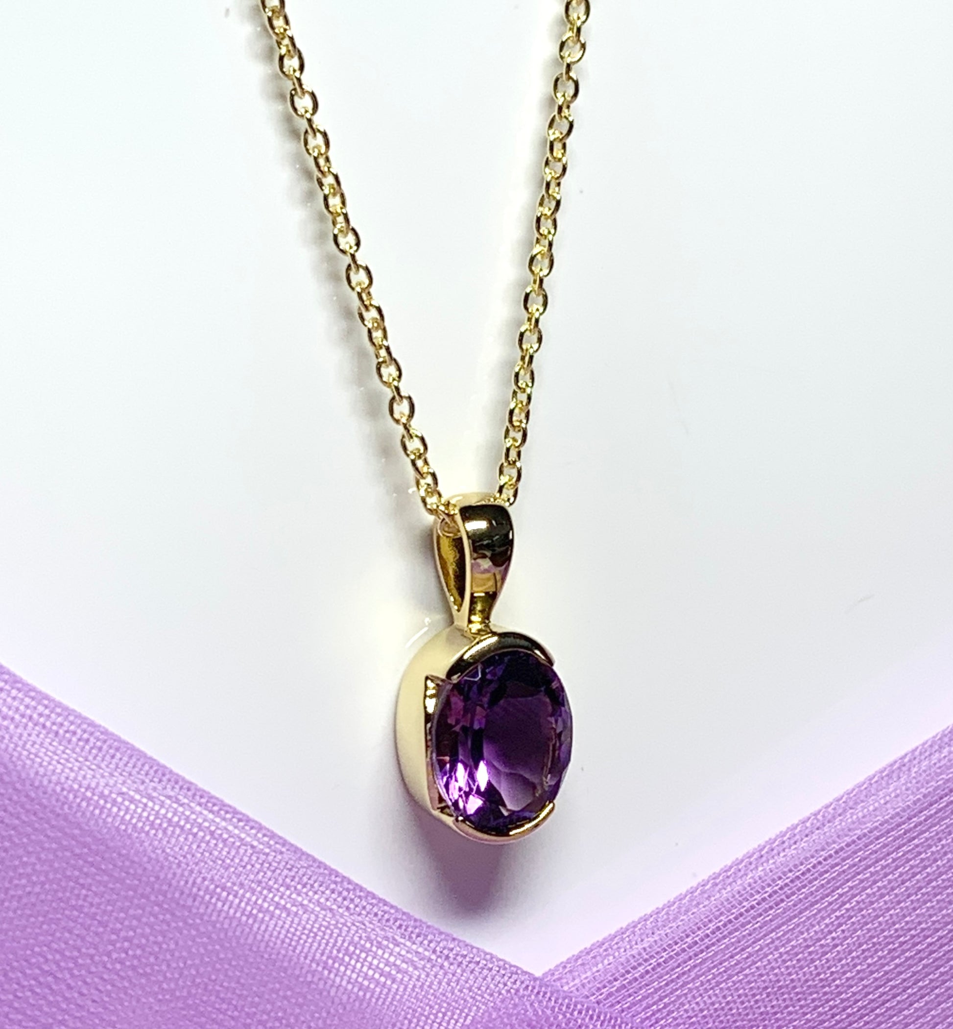 Real purple amethyst necklace pendant oval smooth rubbed over setting silver gilt