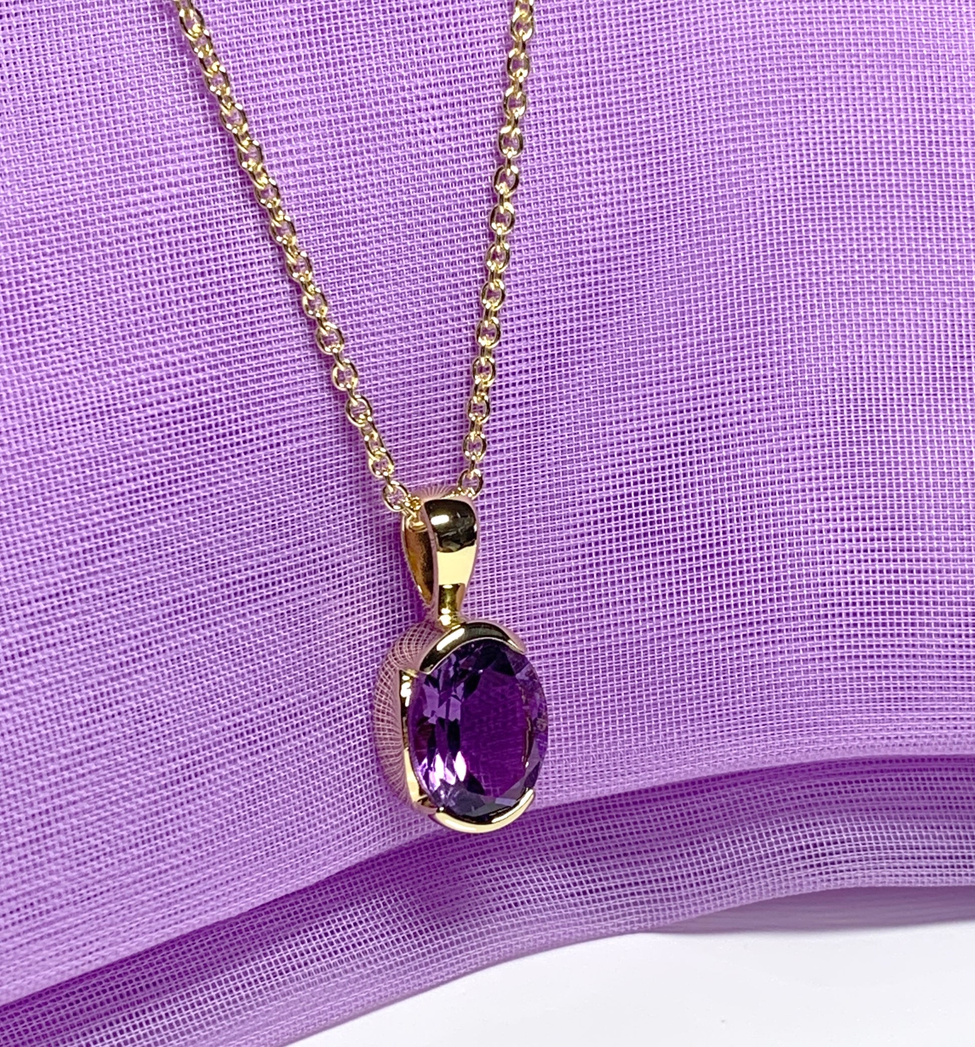 Real purple amethyst necklace pendant oval smooth rubbed over setting silver gilt