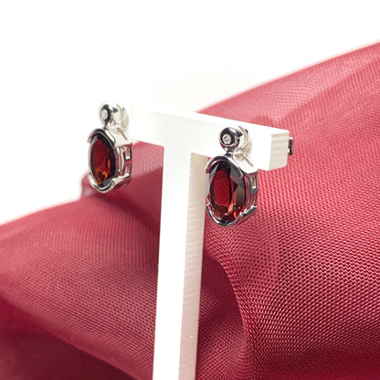 Real red oval garnet and cubic zirconia sterling silver earrings