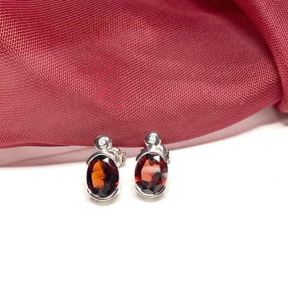 Real red oval garnet and cubic zirconia sterling silver earrings