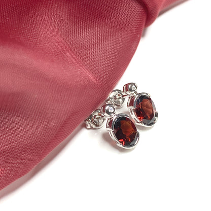 Real red oval garnet and cubic zirconia sterling silver earrings