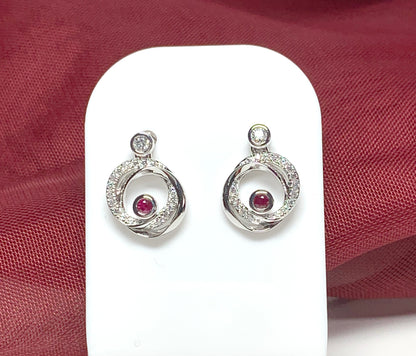 Real red ruby and cubic zirconia round swirl stud earrings