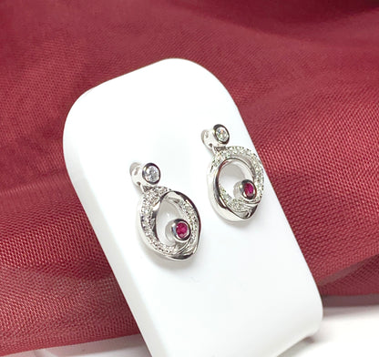 Real red ruby and cubic zirconia round swirl stud earrings