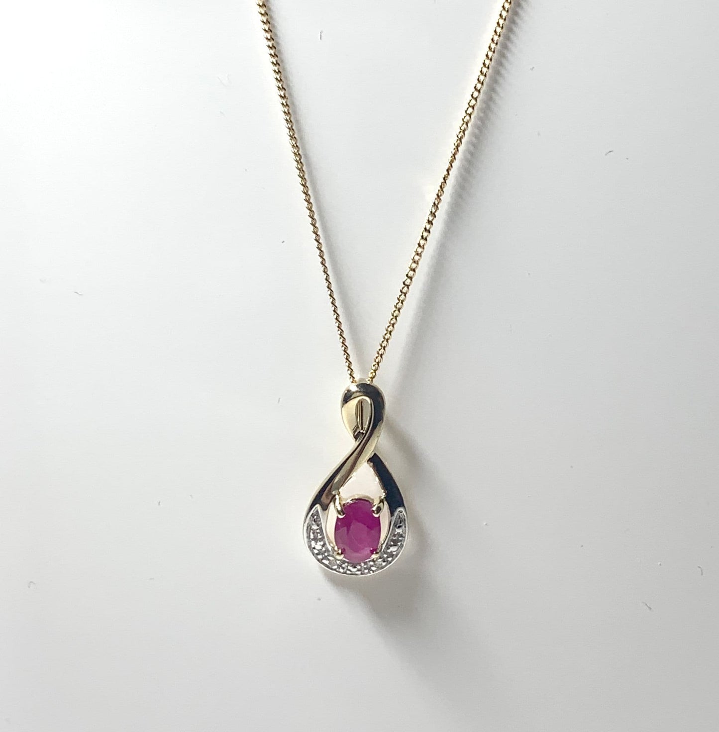 Real red ruby and diamond pierced necklace yellow gold