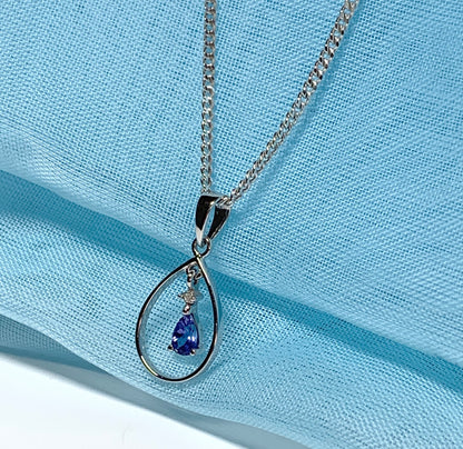 Real tanzanite and diamond necklace white gold open pear shaped