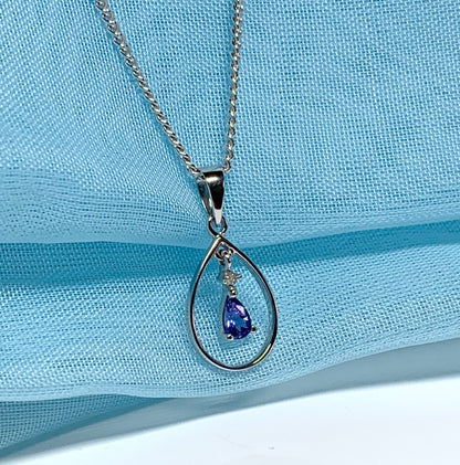 Real tanzanite and diamond necklace white gold open pear shaped