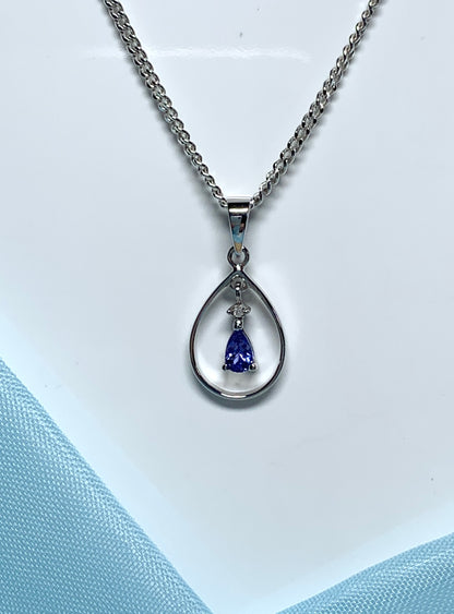 Real tanzanite and diamond necklace white gold open pear shaped