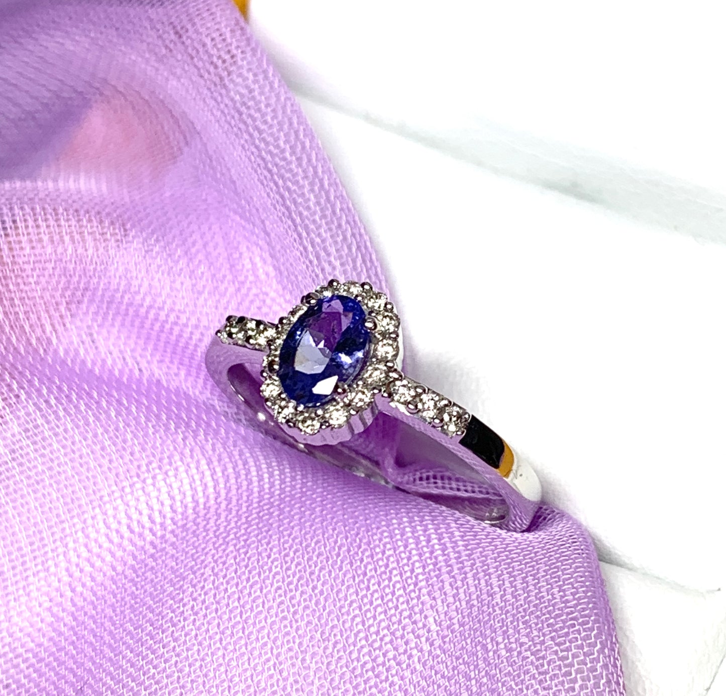 Real tanzanite cluster ring with real diamonds white gold oval