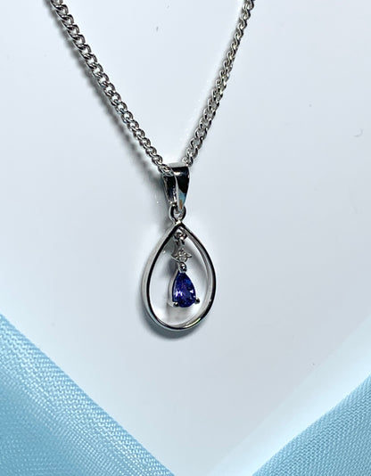 Real tanzanite and diamond necklace white gold open pear shaped