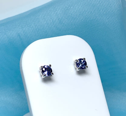 Real tanzanite round white gold round stud earrings