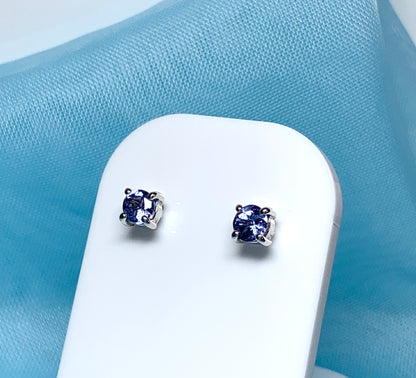 Real tanzanite round white gold round stud earrings