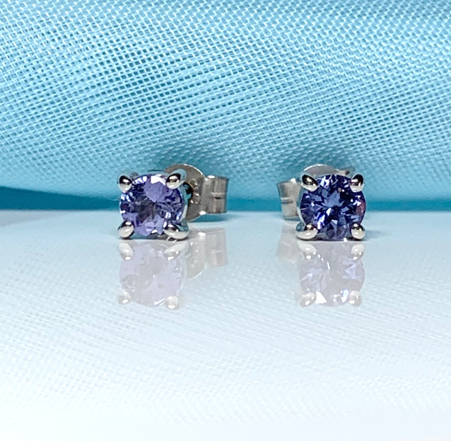 Real tanzanite round white gold round stud earrings