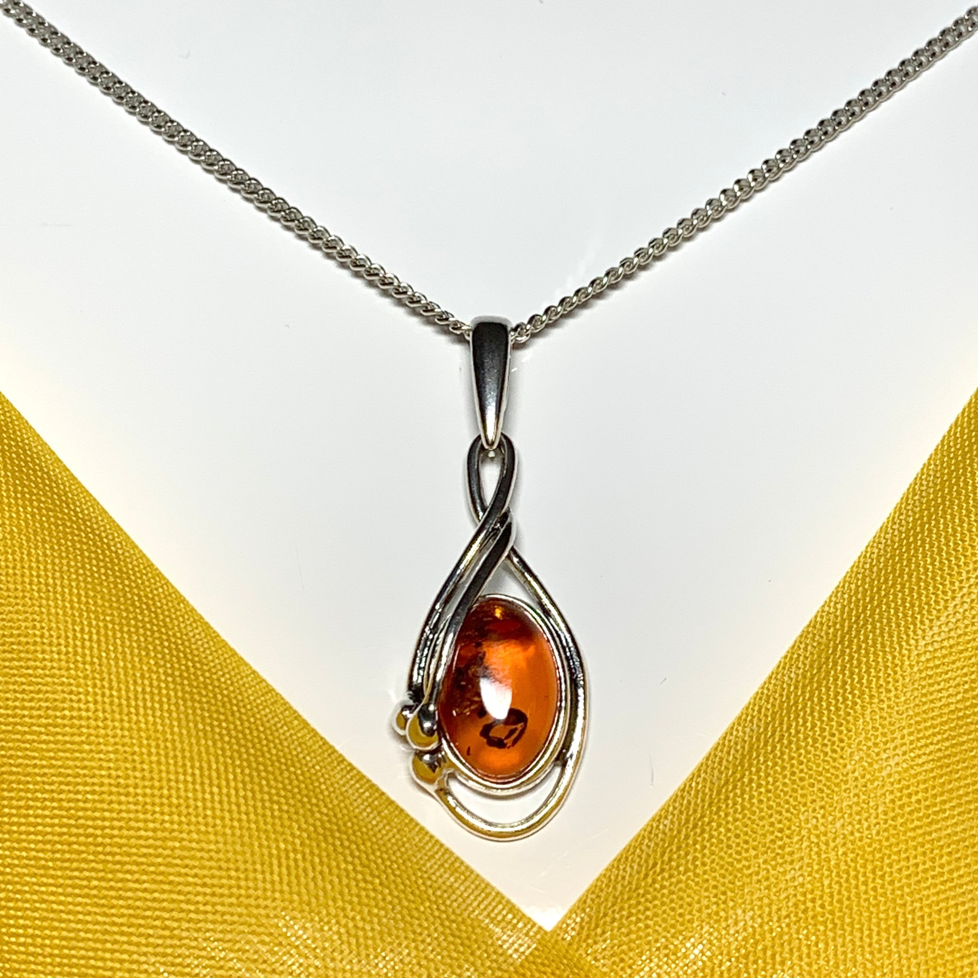 Real teardrop pear shaped fancy amber necklace sterling silver