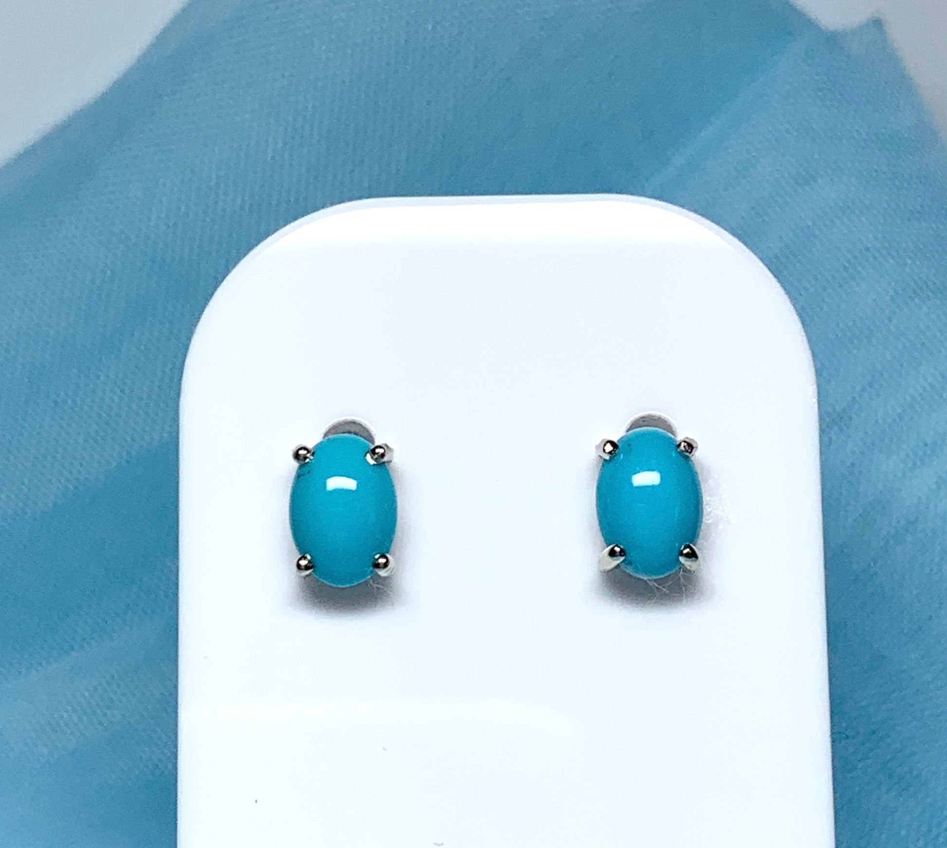 Real turquoise stud earrings oval white gold