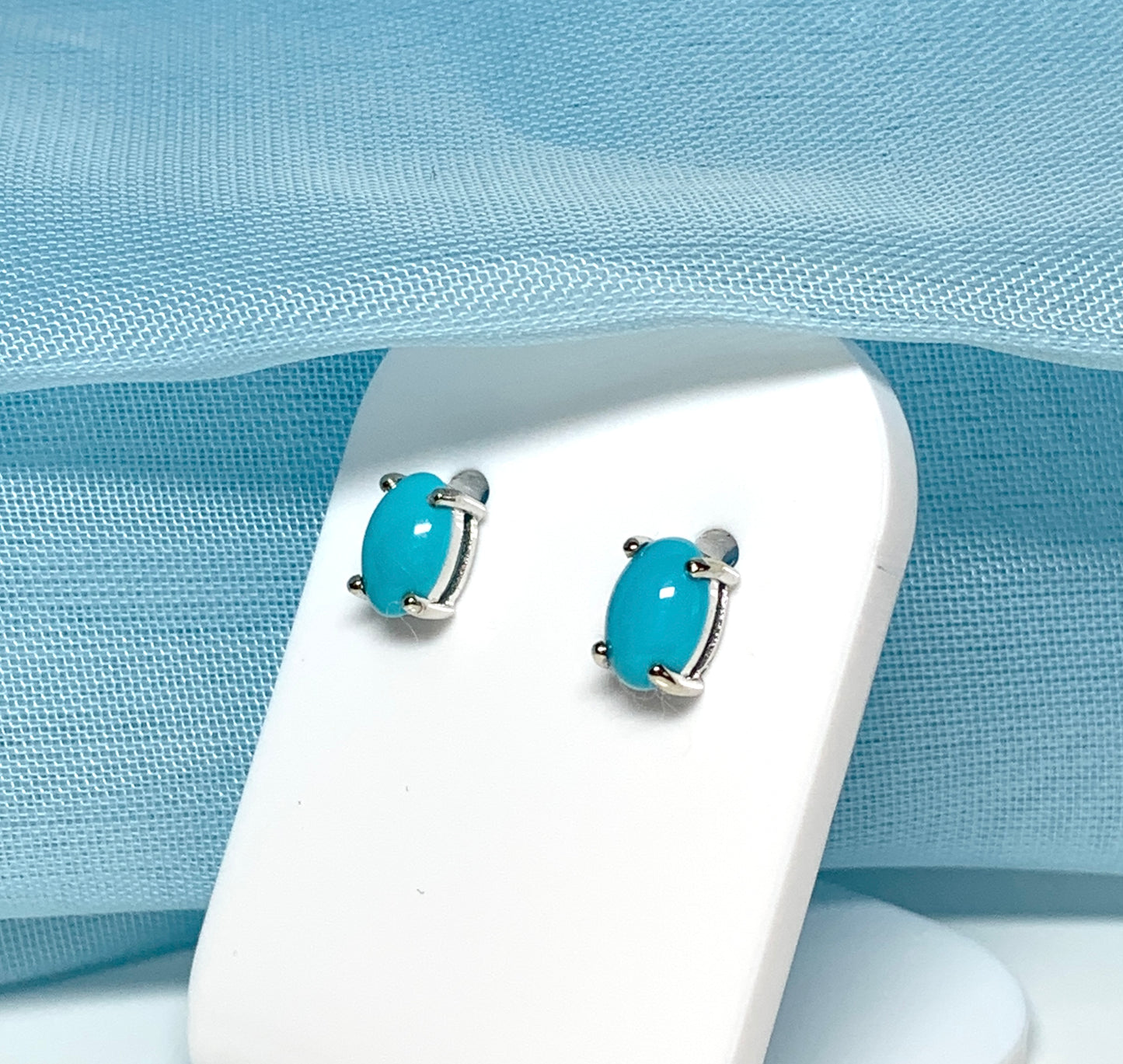 Real turquoise stud earrings oval white gold