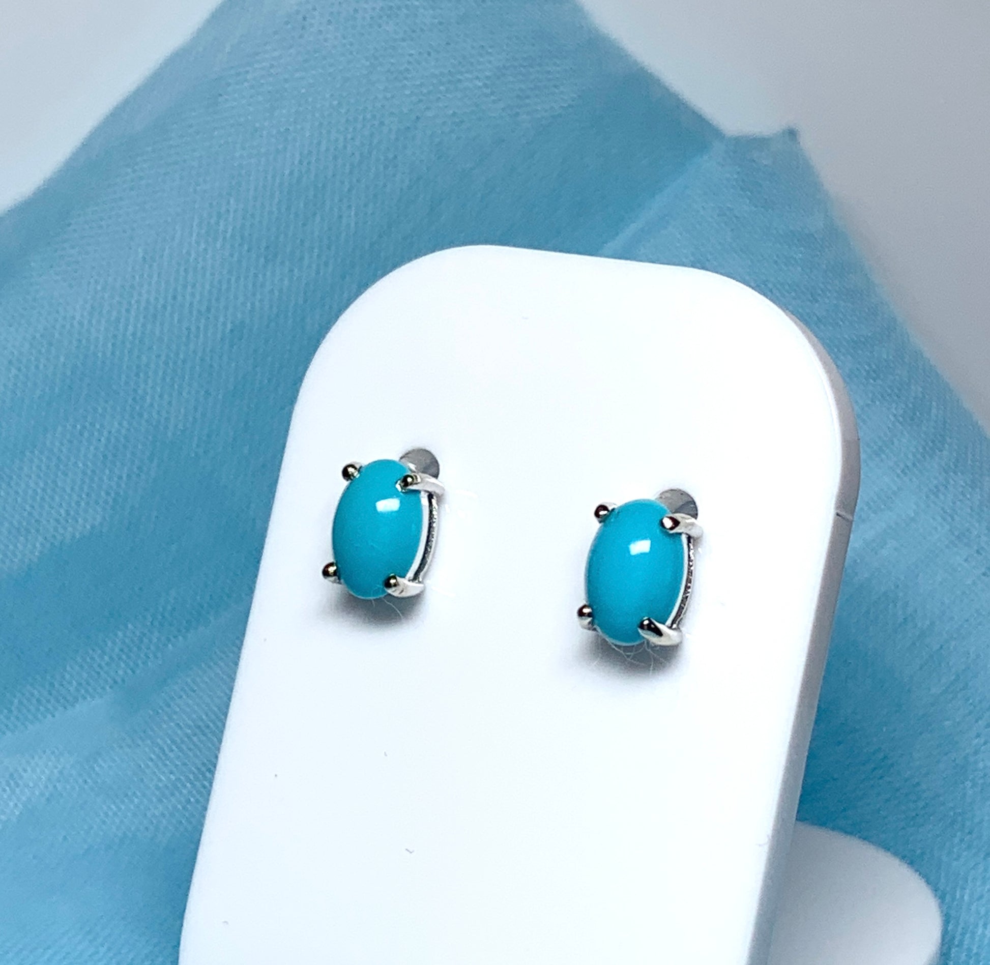 Real turquoise stud earrings oval white gold