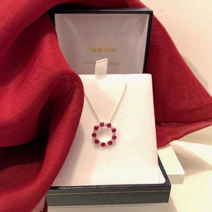 Real deep red round ruby and diamond white gold circle cluster necklace