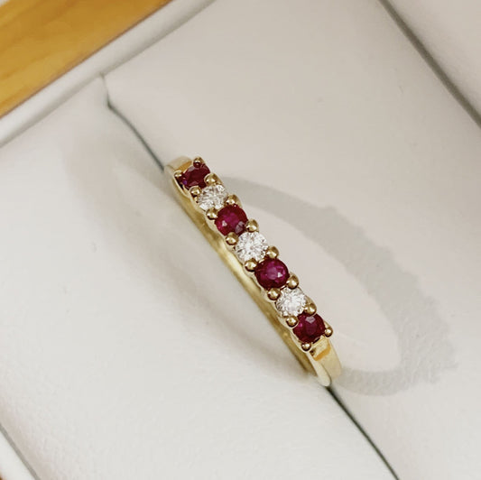 Real red ruby and diamond claw set eternity ring yellow gold