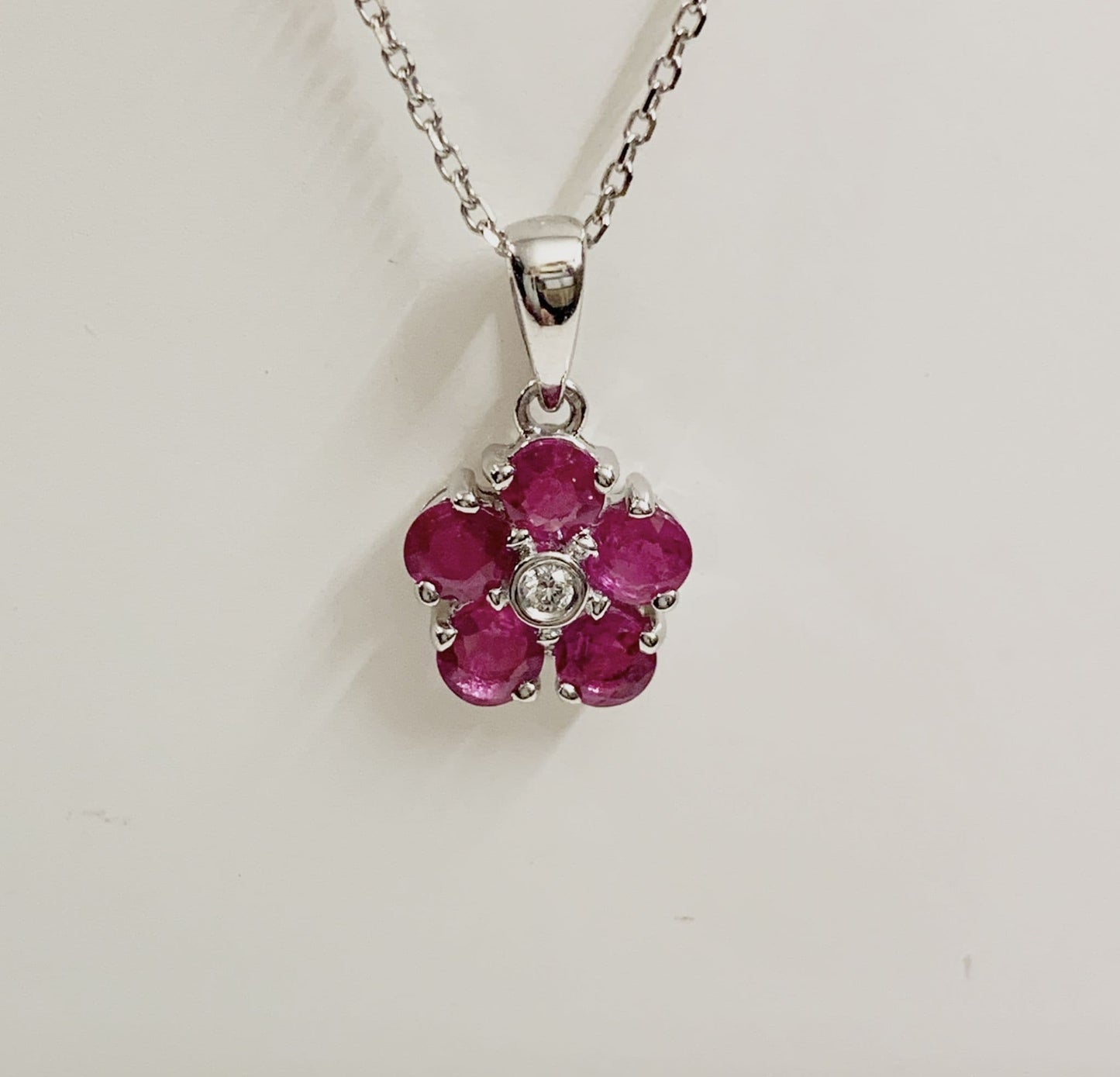 Real red ruby and diamond white gold daisy cluster necklace