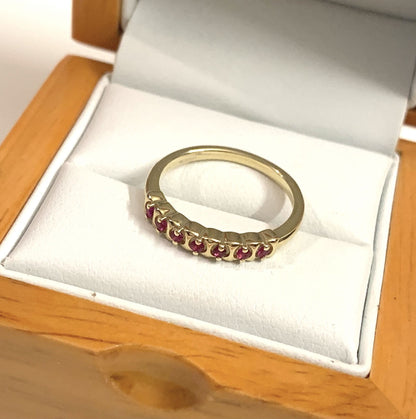 Red ruby eternity ring yellow gold