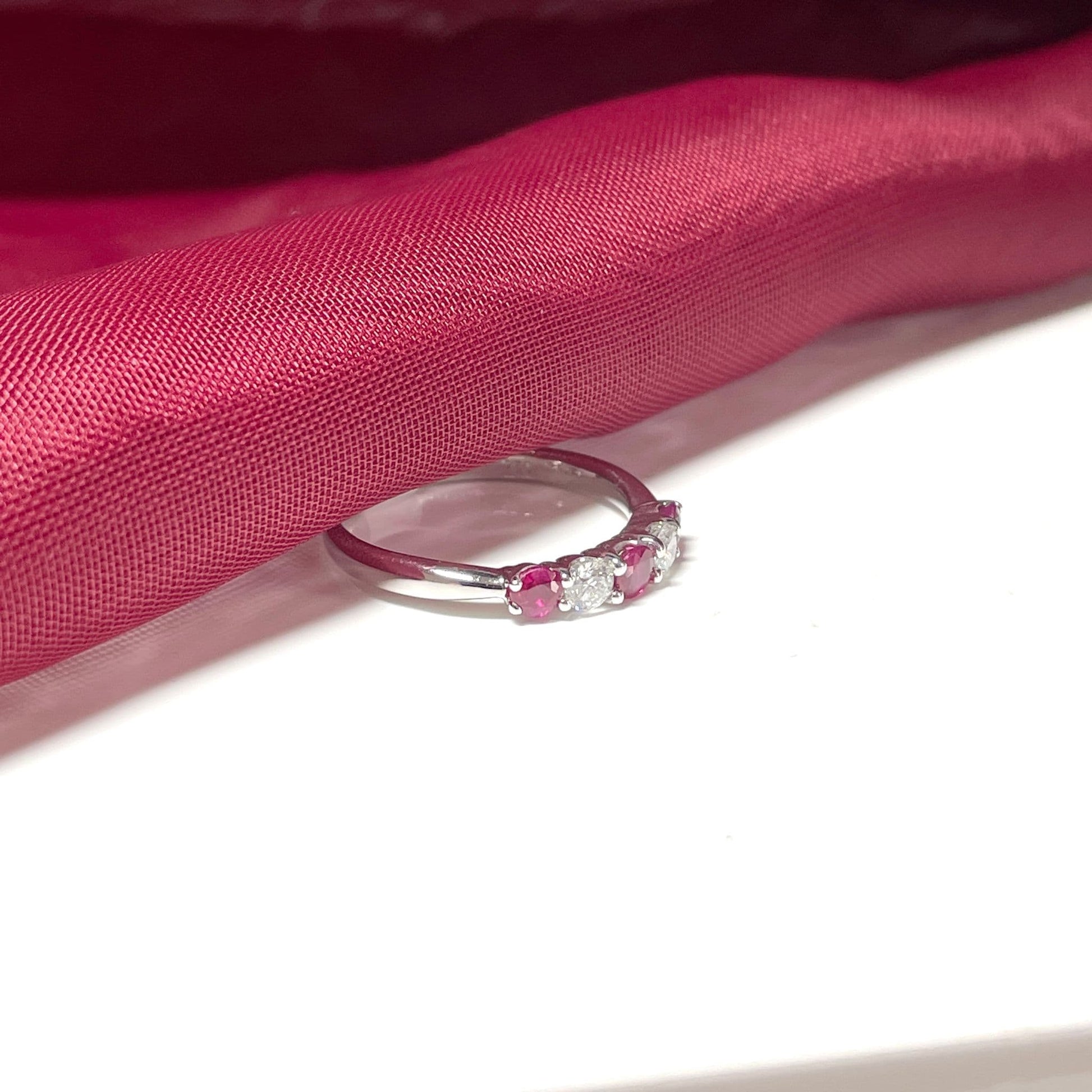 Round Ruby And Diamond White Gold Claw Set Eternity Ring