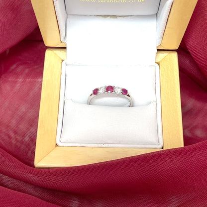 Round Ruby And Diamond White Gold Claw Set Eternity Ring