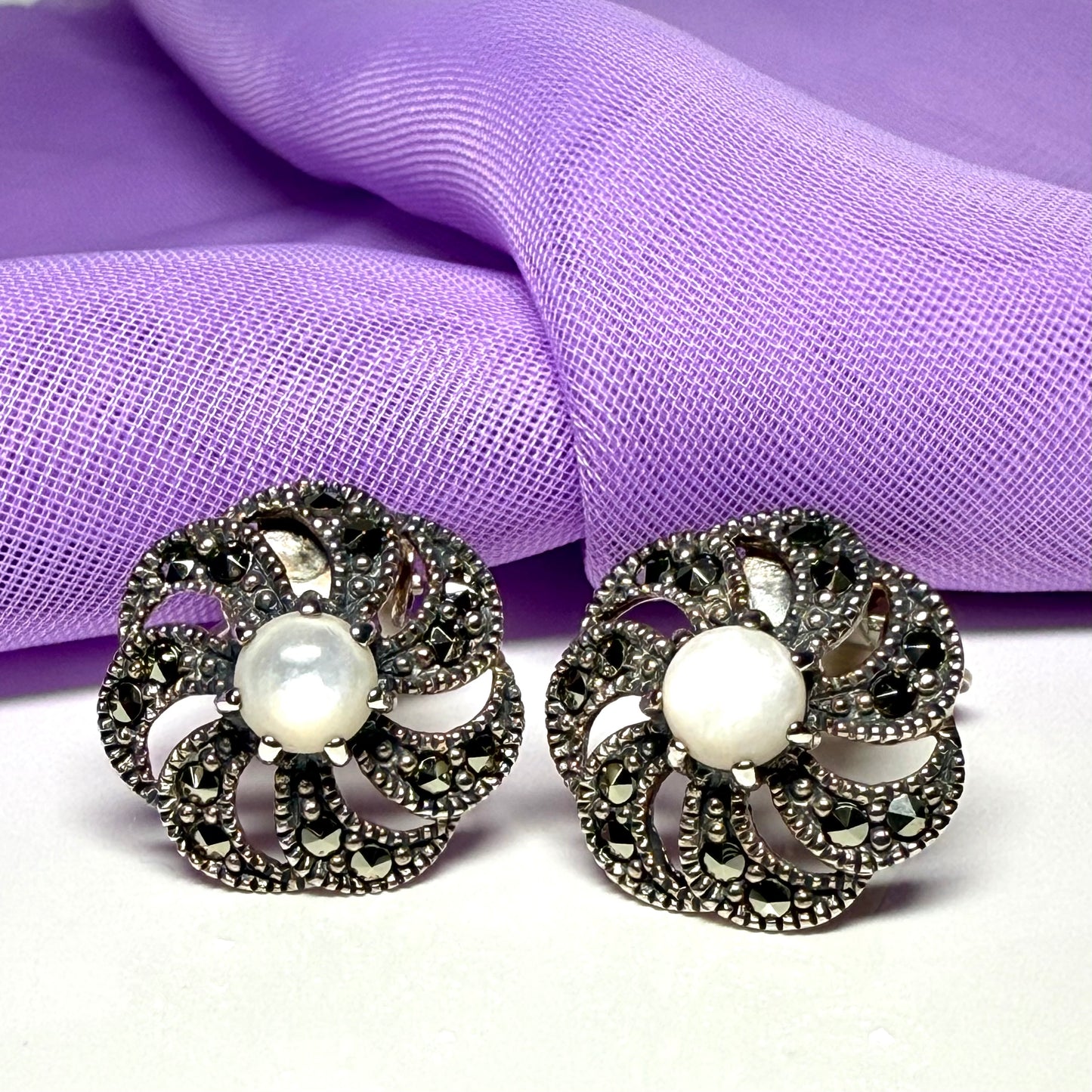Round clip on earrings with marcasite and mother of pearl and  sterling silver
