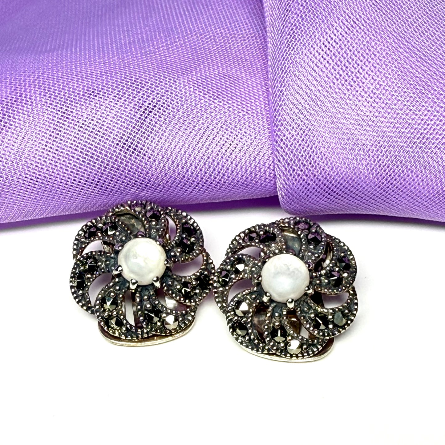 Round clip on earrings with marcasite and mother of pearl and  sterling silver