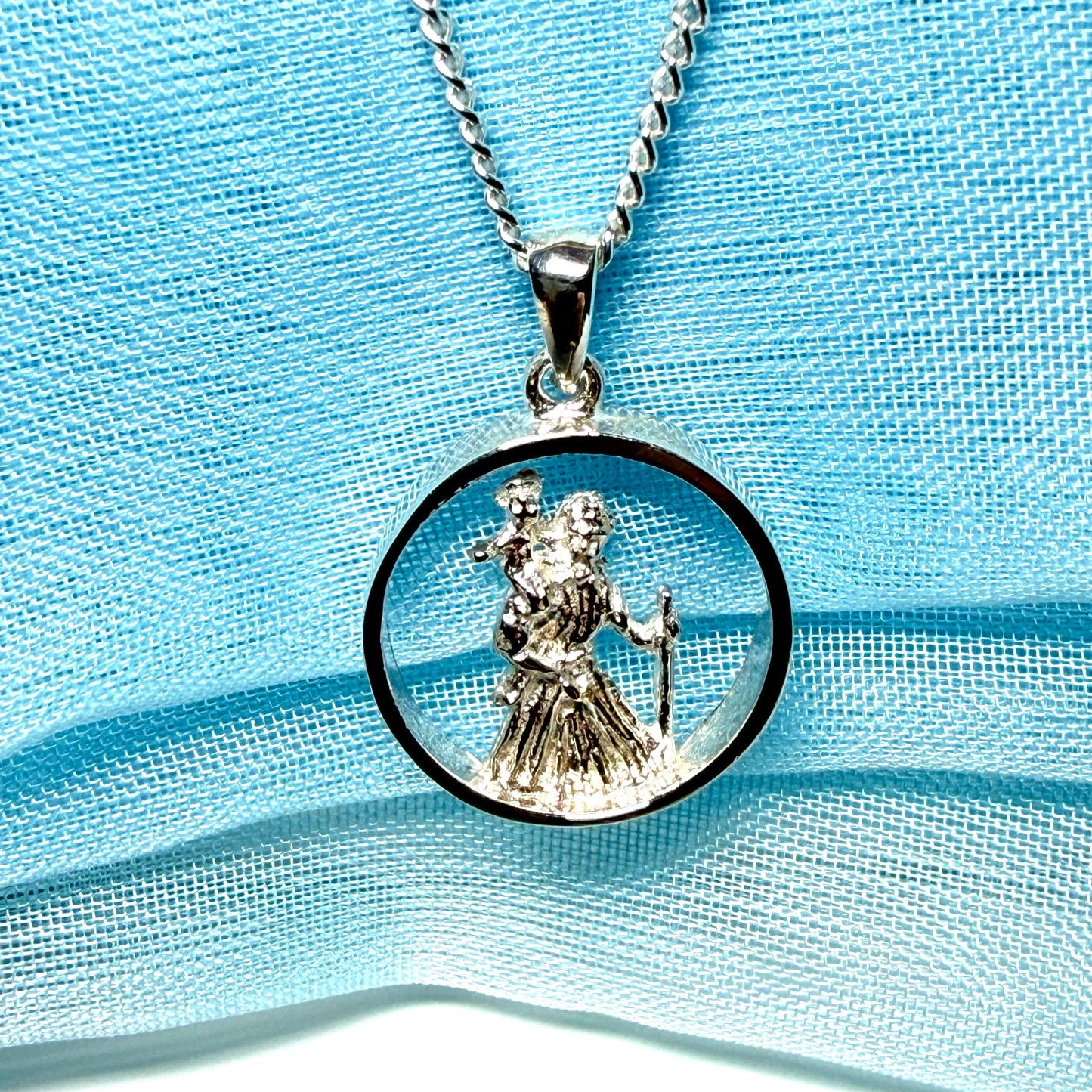 Round sterling silver St. Christopher including chain