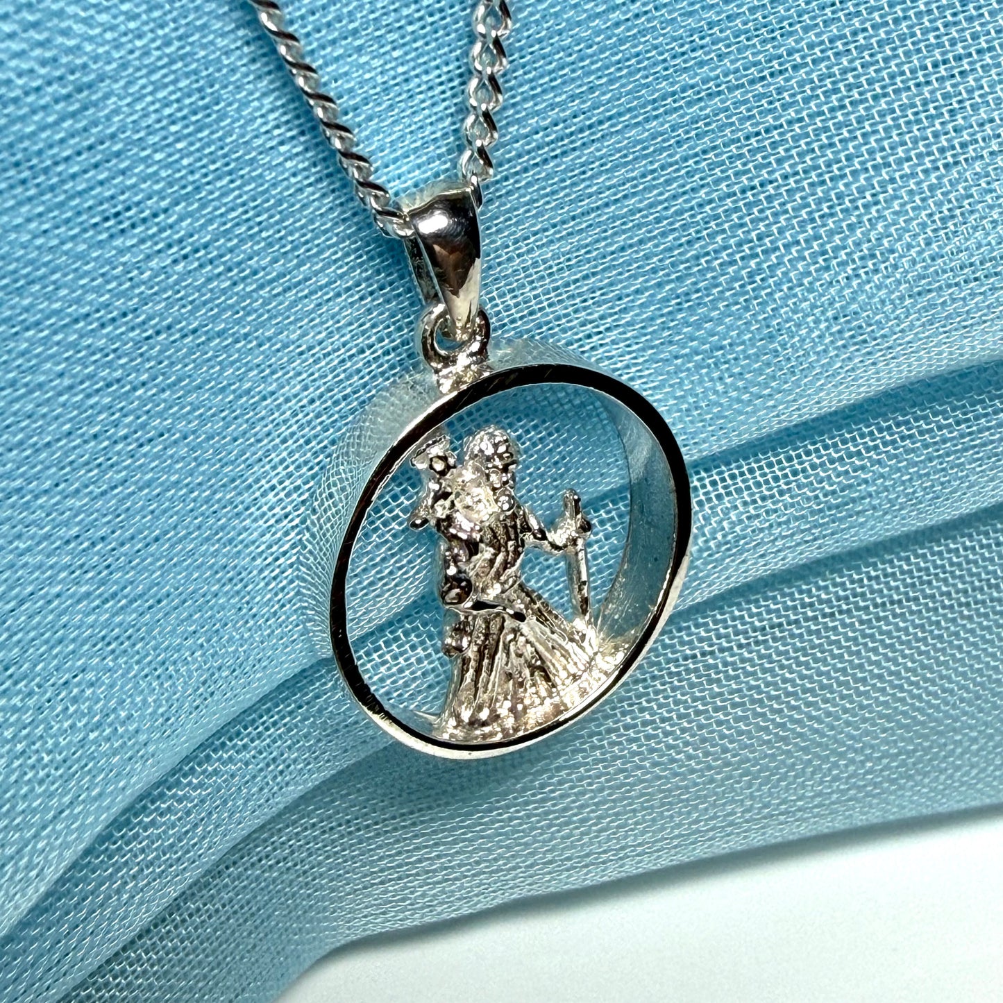 Round sterling silver St. Christopher including chain