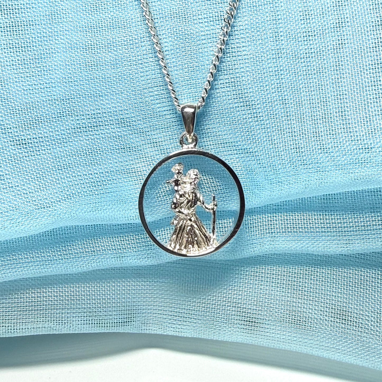 Round sterling silver St. Christopher including chain