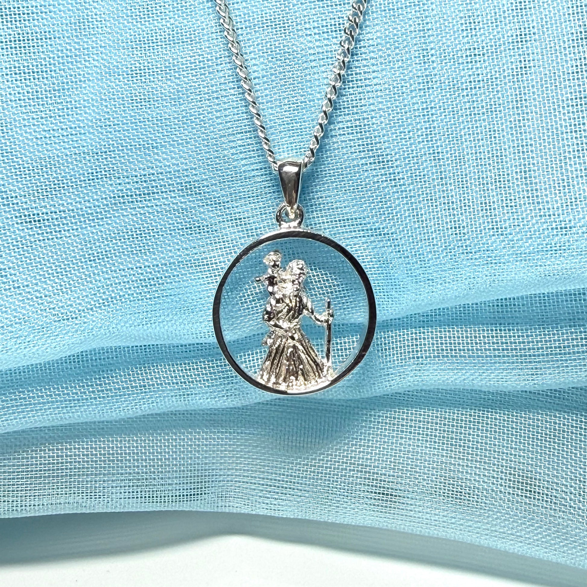 Round sterling silver St. Christopher including chain